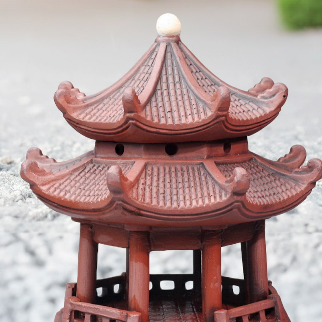 Close-up roof of reddish-brown handcrafted pagoda statue. Quality ceramic pagoda for bonsai.