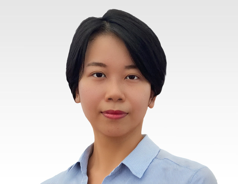 Kim, a dedicated artisan and quality expert at The Viet Potter, gazes confidently at the camera, reflecting her commitment to crafting exquisite handmade ceramic statues.