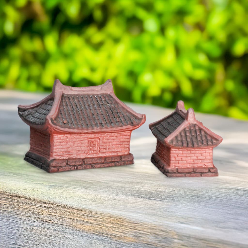 Back view comparison of the Large and Small Miniature House Figurines. These can be used as Bonsai Figurines, Ceramic Terrarium Figurines, or even Ceramic Aquarium Decor.