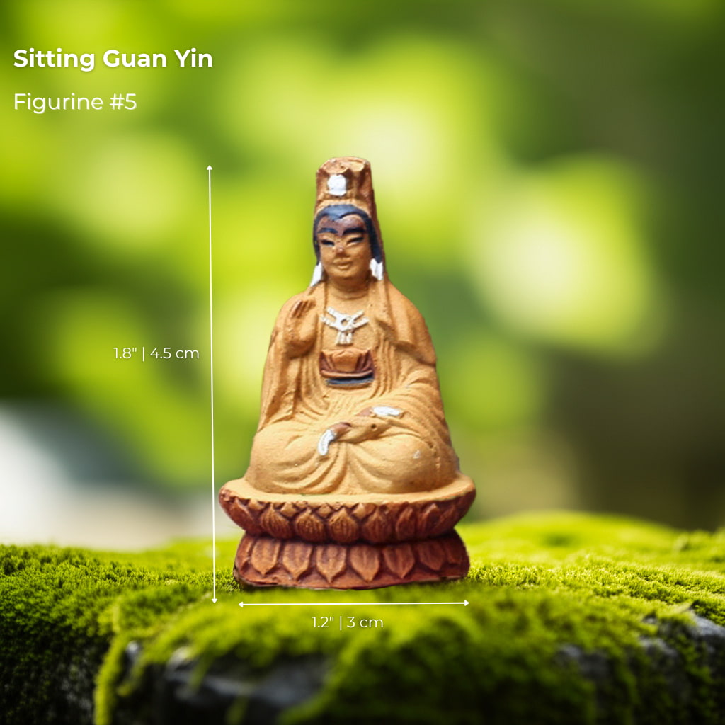 A Sitting Guan Yin bonsai figurine on a lotus. This is a serene mudmen figurine for bonsai decor.