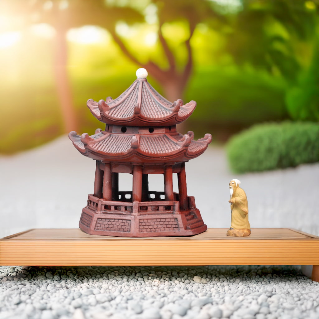 Zen garden pagoda statue for bonsai decor with a bonus sage bonsai figurine on a wooden stand.