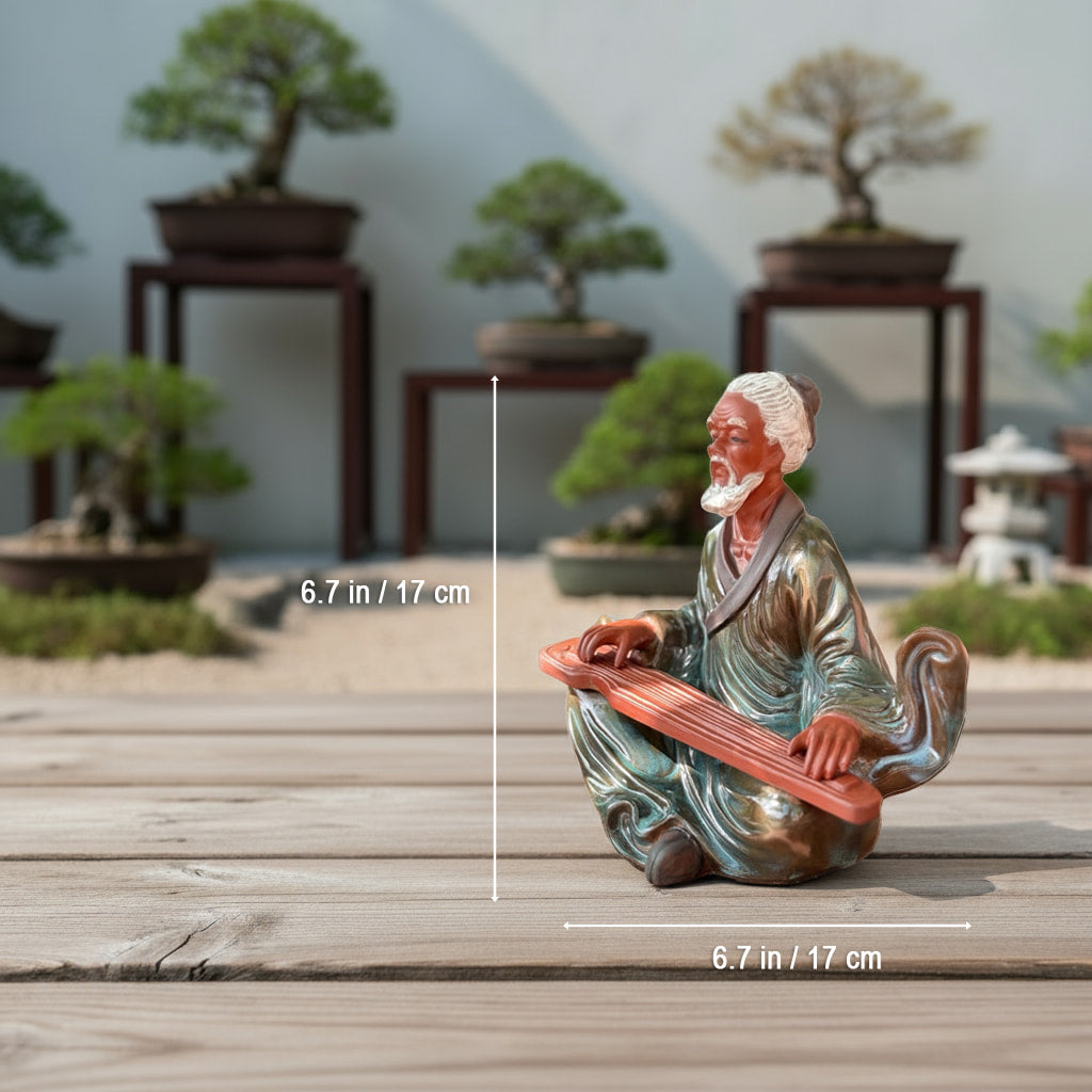 A 17cm green glazed ceramic figurine. It is a unique bonsai figurine for your collection.