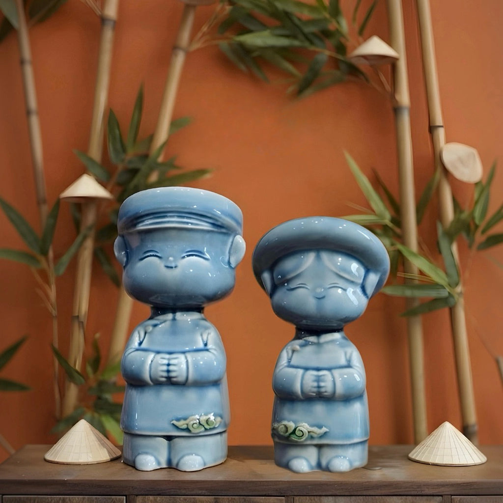Blue Vietnamese ceramic children couple figurines with bamboo and miniature conical hats