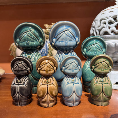 Vietnamese ceramic woman figurines in multiple glaze colors showing the color range
