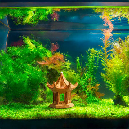 Submerged in a lush green aquarium, a miniature Vietnamese pagoda creates a mystical and peaceful haven for your aquatic companions.