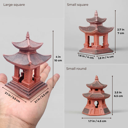 Size guide for three bonsai figurines made of Hoang Tho clay. The image displays a large square miniature pagoda held in a palm for scale, alongside a small square and a small round pagoda with detailed measurements in inches and centimeters.