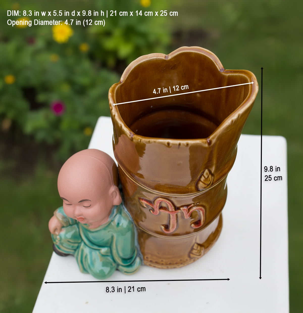  This ceramic figurine pot shows dimensions. The bonsai statue pot is 9.8 in tall, 8.3 in wide.