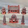 The complete 6-piece set of brown ceramic aquarium decor, including two short wide miniature pagoda pieces, two tall thin pagoda statue pieces, a triple gate, and a central temple. Ideal as bonsai figurines or terrarium figurines.