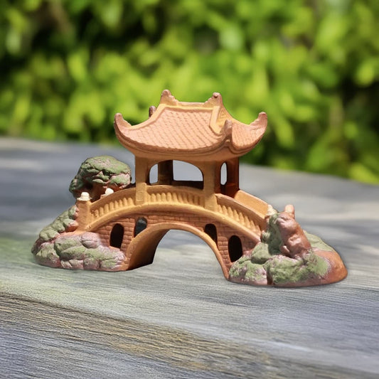 Ceramic pavilion fairy garden bridge on wood. A garden mini bridge for small landscapes.