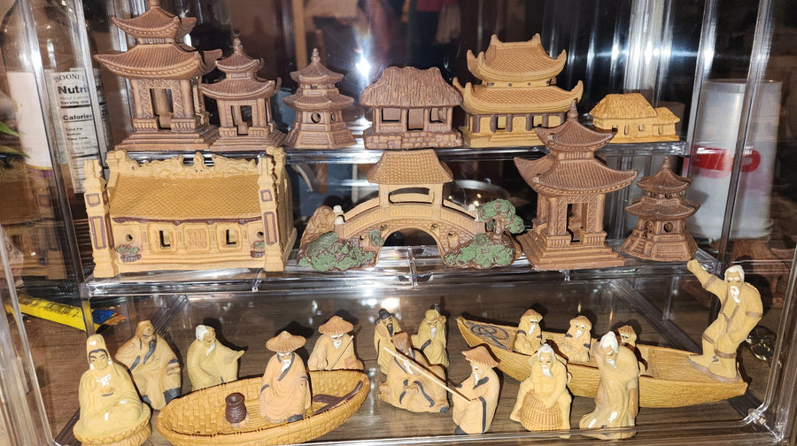Bonsai display with small figurines ready for next season.
