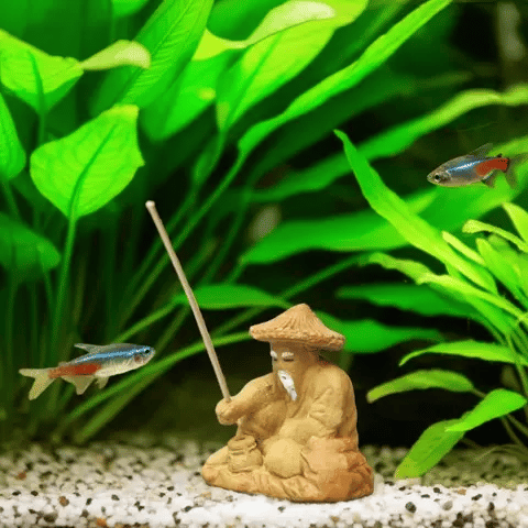 Ceramic fisherman figurines, Chinese mudman fisherman style, for bonsai decor in an aquarium.