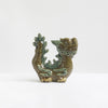 A brown-glazed Vietnamese ceramic dragon figurine with green accents. A protective dragon statue.