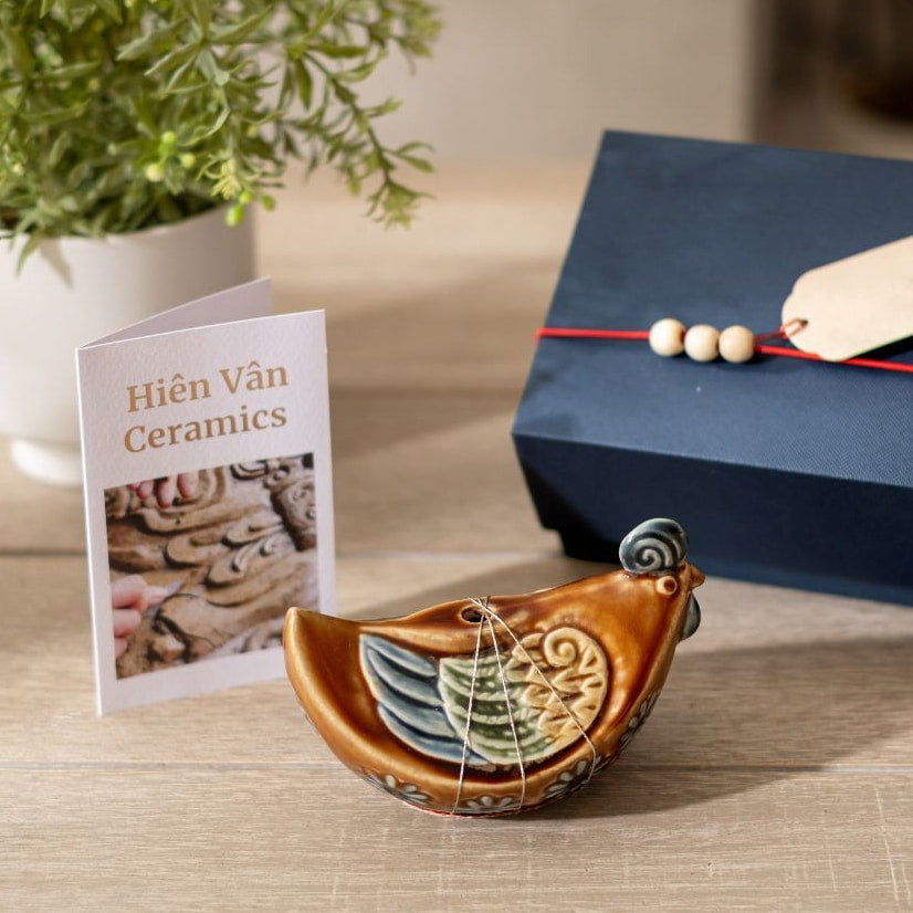 A brown Hien Van pottery rooster with its gift box. A small rooster figurine gift under $100
