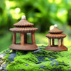 Two sizes of the Japanese pagoda miniature on moss. These Bonsai figurines are a set.