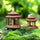 Two sizes of the Japanese pagoda miniature on moss. These Bonsai figurines are a set.