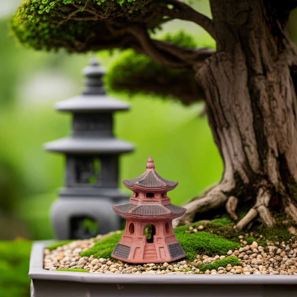  Small red ceramic bonsai figurine, for bonsai tree decorations, by a bonsai tree.