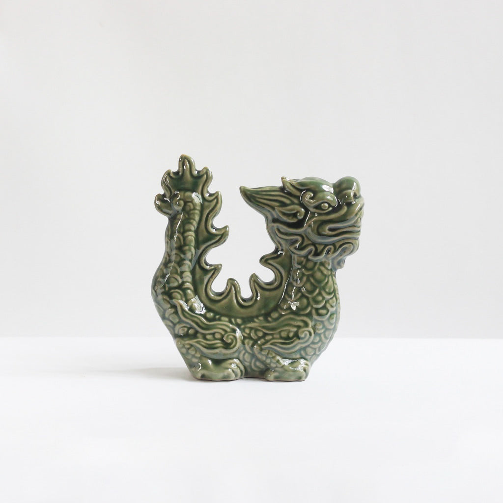 A solid green celadon green dragon figurine. A unique piece of Hien Van ceramic art. 