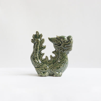 A solid green celadon green dragon figurine. A unique piece of Hien Van ceramic art. 