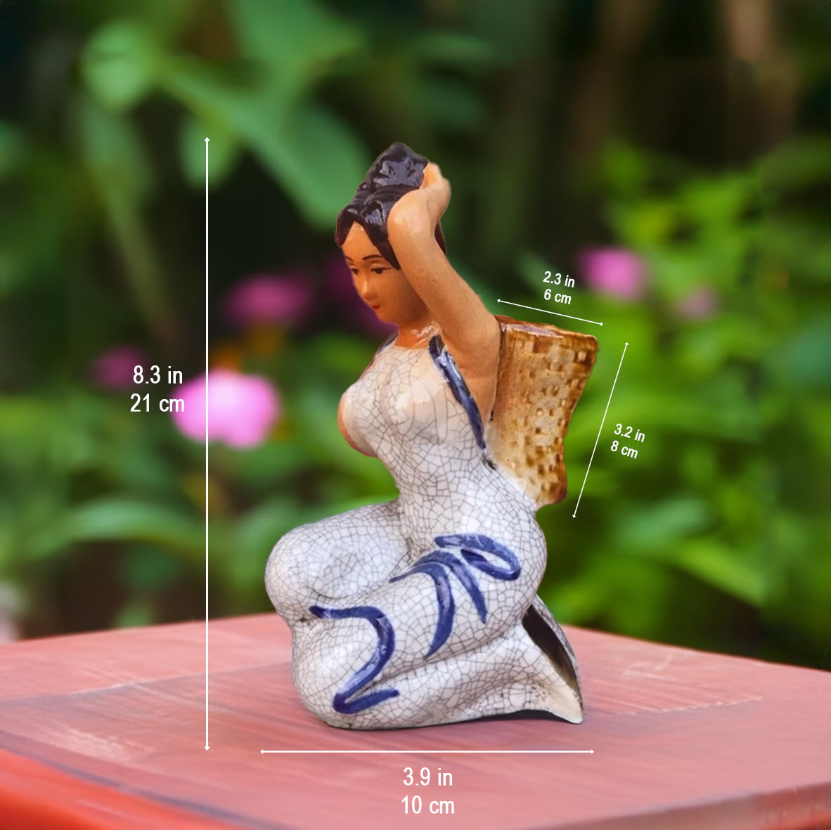A side view of the ceramic figurine pot shows dimensions for this statue bonsai planter.