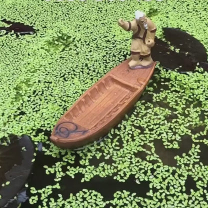 Ceramic Old Fisherman Rowing Boat Figurine